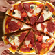 Illustration for article titled Status Of Gathering Upgraded To ‘Party’ By Presence Of Pizza